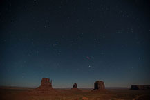 ￼ Monument Valley Under the Stars Still no LakeshoreImages website so I may start adding more photos here.  I did get up to the Monument Valley Overlook/Parking Lot a little after dusk.  I took a series of photos, most at ISO 1600, f:2.8 & 8 to 15 seconds.  There was enough moonlight to show the formations, yet allowed enough of the stars to show to make it interesting.  It would have been better if there was a power blackout - the parking lot has lots of lights.  There are a few images with lights from returning cars, and airplanes, but overall it worked OK.  I washed the trailer & RAV4 on the way out of Gouldings Camp Park.  The water spray didn't remove everything; the bugs need an actual scrubbing, but at least the first layer of red dust is gone.  It was a short drive to Blanding, UT & the Blue Mountain RV Park.  I'm in site 8, a shaded back in that just fits the trailer & RAV4. After setting up I plan to drive out to the location for the trail to House on Fire.  It is too late in the day to properly photograph it - I'll do that tomorrow.  I did drive out to the trail head, and also stopped at the "Official" Mule Canyon Ruin Exhibit, about 1/2 mile west of Arch Canyon road, the entrance to the trail head. Laurent Martres, who's 3 books "Photographing the Southwest" have been my guide to many locations feels that the exhibit was built to keep down traffic in the canyon.  I'll have to agree with him - it is far to new looking to be realistic.  ￼ Mule Canyon Ruin Exhibit   ￼ Mule Canyon Ruin Exhibit After that it was back to the campground by way of the local grocery store & some barbecued chicken for dinner.  Until Tomorrow - Monument Valley