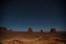 ￼ Monument Valley Under the Stars Still no LakeshoreImages website so I may start adding more photos here.  I did get up to the Monument Valley Overlook/Parking Lot a little after dusk.  I took a series of photos, most at ISO 1600, f:2.8 & 8 to 15 seconds.  There was enough moonlight to show the formations, yet allowed enough of the stars to show to make it interesting.  It would have been better if there was a power blackout - the parking lot has lots of lights.  There are a few images with lights from returning cars, and airplanes, but overall it worked OK.  I washed the trailer & RAV4 on the way out of Gouldings Camp Park.  The water spray didn't remove everything; the bugs need an actual scrubbing, but at least the first layer of red dust is gone.  It was a short drive to Blanding, UT & the Blue Mountain RV Park.  I'm in site 8, a shaded back in that just fits the trailer & RAV4. After setting up I plan to drive out to the location for the trail to House on Fire.  It is too late in the day to properly photograph it - I'll do that tomorrow.  I did drive out to the trail head, and also stopped at the "Official" Mule Canyon Ruin Exhibit, about 1/2 mile west of Arch Canyon road, the entrance to the trail head. Laurent Martres, who's 3 books "Photographing the Southwest" have been my guide to many locations feels that the exhibit was built to keep down traffic in the canyon.  I'll have to agree with him - it is far to new looking to be realistic.  ￼ Mule Canyon Ruin Exhibit   ￼ Mule Canyon Ruin Exhibit After that it was back to the campground by way of the local grocery store & some barbecued chicken for dinner.  Until Tomorrow - Monument Valley