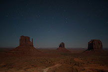 ￼ Monument Valley Under the Stars Still no LakeshoreImages website so I may start adding more photos here.  I did get up to the Monument Valley Overlook/Parking Lot a little after dusk.  I took a series of photos, most at ISO 1600, f:2.8 & 8 to 15 seconds.  There was enough moonlight to show the formations, yet allowed enough of the stars to show to make it interesting.  It would have been better if there was a power blackout - the parking lot has lots of lights.  There are a few images with lights from returning cars, and airplanes, but overall it worked OK.  I washed the trailer & RAV4 on the way out of Gouldings Camp Park.  The water spray didn't remove everything; the bugs need an actual scrubbing, but at least the first layer of red dust is gone.  It was a short drive to Blanding, UT & the Blue Mountain RV Park.  I'm in site 8, a shaded back in that just fits the trailer & RAV4. After setting up I plan to drive out to the location for the trail to House on Fire.  It is too late in the day to properly photograph it - I'll do that tomorrow.  I did drive out to the trail head, and also stopped at the "Official" Mule Canyon Ruin Exhibit, about 1/2 mile west of Arch Canyon road, the entrance to the trail head. Laurent Martres, who's 3 books "Photographing the Southwest" have been my guide to many locations feels that the exhibit was built to keep down traffic in the canyon.  I'll have to agree with him - it is far to new looking to be realistic.  ￼ Mule Canyon Ruin Exhibit   ￼ Mule Canyon Ruin Exhibit After that it was back to the campground by way of the local grocery store & some barbecued chicken for dinner.  Until Tomorrow - Monument Valley