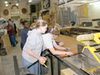 Attaching an outfeed table to the saw