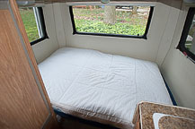 I also added a sloped mattress to make my doctor happy - some stomach problems seem to improve sleeping on a slant. I had to modify the topper cover to fit both it & the tapered mattress, but in the end it works, and is comfortable.